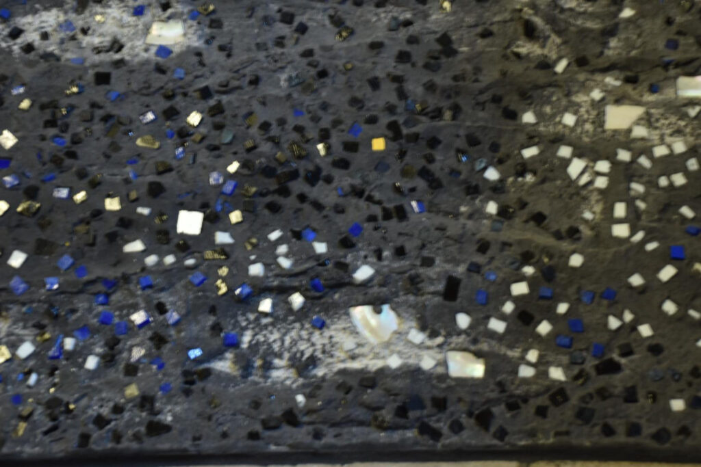 The many pieces of white, blue and black