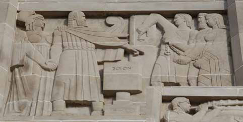 6. Walk through the monument and up onto the promenade